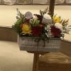 A warm, handcrafted arrangement that feels like sunshine on a windowsill, perfect