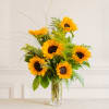 Sunflower bouquet in a clear glass vase
