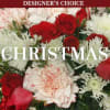 Red roses and white carnations in a Christmas bouquet