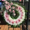 Beautiful Wreath made of a mixture of roses and carnations. 