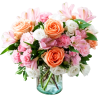 Roses, Alstromeria, Ranunculus, Carnations arranged in a vase