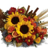 Sunflower and rose bouquet with red daisies and cinnamon sticks