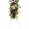 Convey your respect and admiration with this spray of striking red and