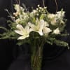 Serenity in blooms. This beautiful, two-toned arrangement is ideal for sympathy, weddings