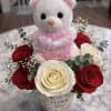 A handcrafted floral arrangement in a keepsake &ldquo;I Love You&rdquo; mug. Designed