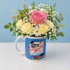 Celebrate their achievement with a cheerful floral arrangement in a keepsake reusable