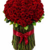Large bouquet of red roses with a red ribbon around the stems