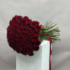 Large bouquet of deep red roses with a red ribbon
