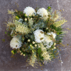 White dahlia bouquet with pale yellow accents and mixed greenery