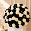 Black and white rose bouquet with pearl accents in a white box