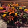 Mixed bouquet with orange lilies and yellow roses