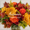 Autumn bouquet with orange roses and yellow chrysanthemums