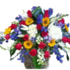 Mixed bouquet with red roses, white lilies, yellow daisies, and blue flowers in a vase