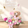 Basket arrangement with pink and white roses, teddy bears, and a clear balloon