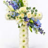 White floral cross with blue and cream flowers