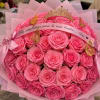Pink rose bouquet with a tiara and birthday ribbon