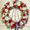 This beautiful red, white and blue wreath is a dignified expression of