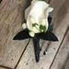 White rose boutonniere with black ribbon and pearl pins