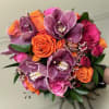Bouquet of purple orchids and orange and pink roses