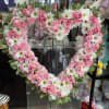 Heart of fresh flowers designed on a 22 inch heart in your