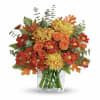 Fragrant roses, eucalyptus, and mums will fill your home with the fresh