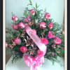 Pink rose bouquet with lilies and a pink ribbon