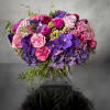 Touch their heart with this lavishly abundant and elegant arrangement in hues