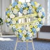 Banner not included*
A large heart-shaped standing spray in soft whites, sky blues