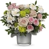 Pink and white roses with white alstroemeria in a glass vase