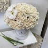 White roses beautifully arranged in a signature box. 