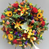 Full of memories of fall flowers, roses and lilies. Approximately 36" across.