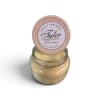 Scented candle in a glass jar with a round lid