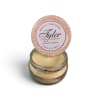 Scented candle in a glass jar with a round printed lid
