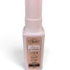 Pink room spray bottle with a tall cap