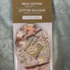 Packaged wild cotton scented air freshener with cotton boll artwork