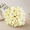Bouquet of white roses on a tabletop
