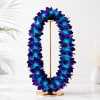 Celebrate life&rsquo;s most memorable milestones with this stunning Blue Dendrobium Orchid Lei.