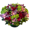 This romantic early spring arrangement features bold and passionate calla lilies, hot