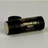 Black lip balm tube labeled Peppermint on a white surface