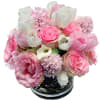 Pink and white mixed bouquet in a round vase