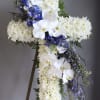 A dignified, devotional cross crafted for a memorial or funeral service -