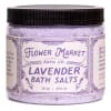 Jar of lavender bath salts with a black lid