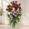 Standing floral spray with red roses and pink lilies