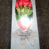 Box of red roses with a silver ribbon bow