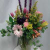 A fun mixture of liatris, tulips, alstroemeria, solidago, stock and other flowers.