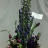 This arrangement is done in shade of purples for light to dark.