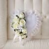 White rose heart wreath with a sheer ribbon bow