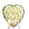 Heart-shaped white floral standing spray with ribbon