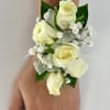 White spray roses with babies breath and tulle for just the right
