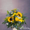 Yellow sunflower and rose bouquet with white daisies in a vase
